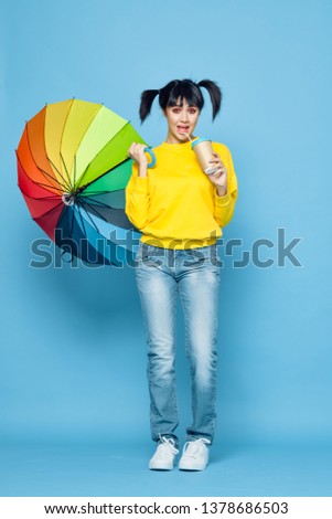   cute ponytail girl with coffee umbrella                            