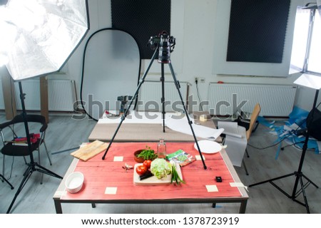 Take photographs of food with lighting, in a photo studio