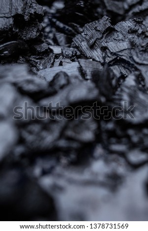 Close-up of black wet charcoal for background