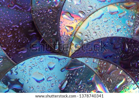 abstract circles background. CDs SD multicolor water drops background. Creative background.