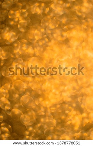 Close Up of Gold Glitter with Bokeh For Background