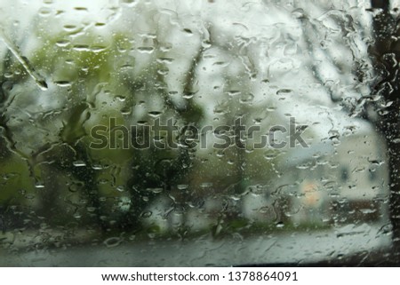 Rain on a window during a storm.