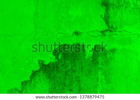 Plaster surface and green color similar to abstract art.