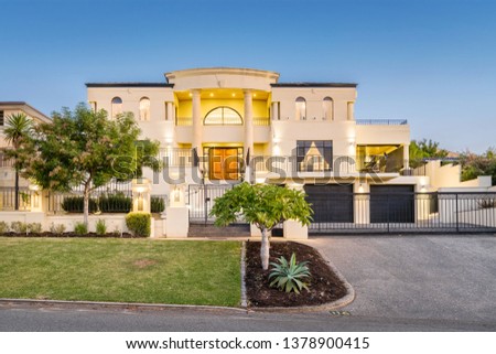 Front elevation / facade of a typical new modern double storey Australian style home. Royalty-Free Stock Photo #1378900415