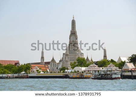 Wat Arun Pagoda Temple with towers in Bangkok, Thailand. Popular thai buddhism landmark around travellers.