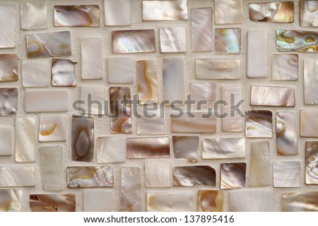 Closeup photo of Mother of pearl mosaic tiles. 