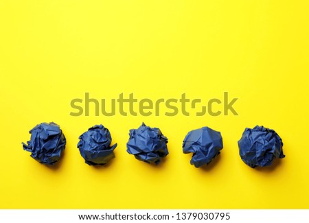 Crumpled sheets of paper on color background, flat lay. Space for text