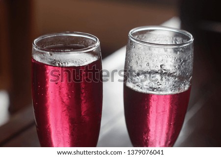 cool red drinks in the glass and suitable for drinking during the day

