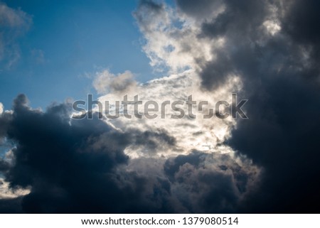 This is a capture of some clouds taken in Lebanon after a stormy weather and you can see the beautiful white and black layers 