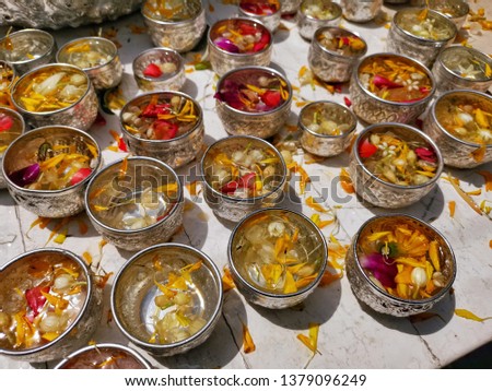 Thai traditional colorful flower in silver bowl for Songkran festival or Thai New Year's national holiday Royalty-Free Stock Photo #1379096249