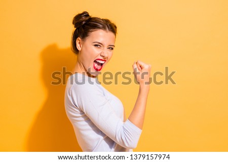 Profile side view portrait of her she nice cool attractive lovely winsome sweet cheerful cheery crazy girl breakthrough lucky isolated on bright vivid shine yellow background Royalty-Free Stock Photo #1379157974