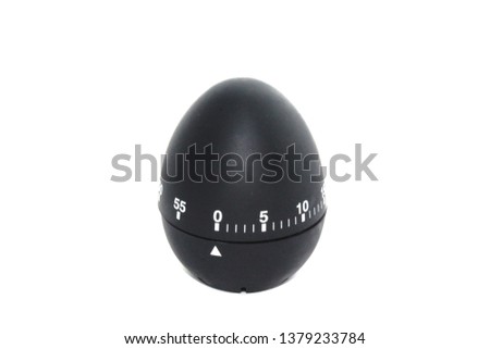 Timer in the form of black eggs on a white background