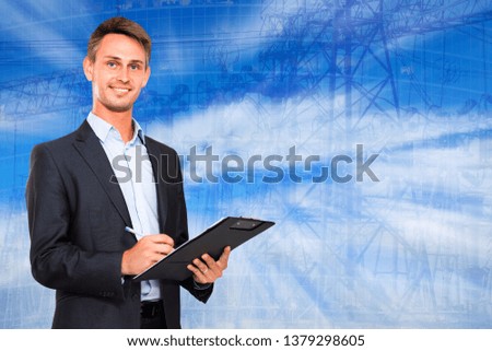 Businessman signing document on divergent rays on city landscape background