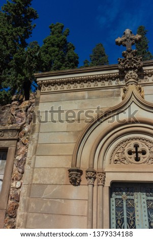 elements of architectural decorations of buildings, plaster moldings, doors with arches, gates with bars. On the streets in Catalonia, public places.