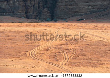bedouin camp in incredible lunar landscape in Wadi Rum village in the Jordanian red sand desert. Wadi Rum also known as The Valley of the Moon,  Jordan - Image