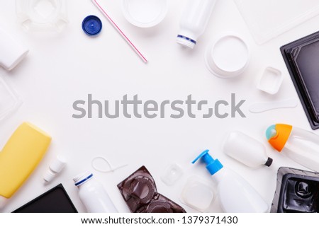 Selection of plastic garbage for recycling on white background. Concept of recycling