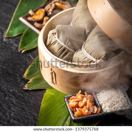 Zongzi, delicious fresh hot steamed rice dumplings in steamer. Close up, copy space, famous asian tasty food in dragon boat duanwu festival