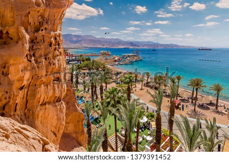 Eialt is Israeli southernmost tourist and resort city, located on the northern shores of the Red Sea, image depicts a concept of blissful, happy and safe vacation Royalty-Free Stock Photo #1379391452