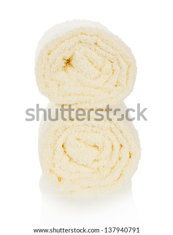 Two towels a roll isolated on the white