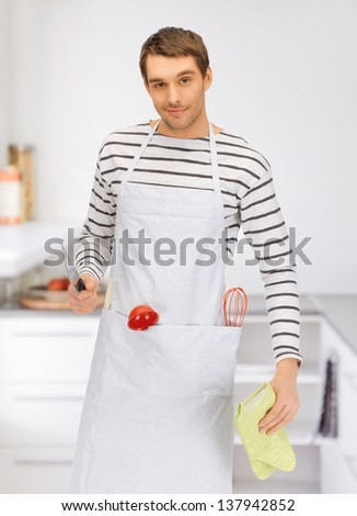 bright picture of handsome man with knife