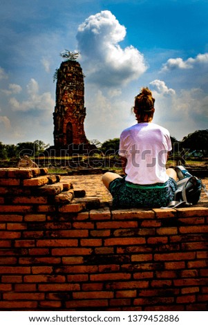 Crumbling Remains of a Forgotten Era, Temples and Statues at Ayutthaya Buddhist Ruins Historical Site, Thailand.