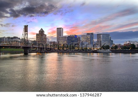 Portland Oregon Downtown City Skyline with Historic Hawthorne Bridge Across Willamette River at Sunset. Best for smaller scale.