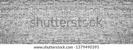 Wide gray shabby brick wall texture. Old masonry panorama. Brickwork panoramic retro grunge background