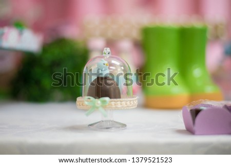 Sweets and decoration on the table - Children's birthday garden theme