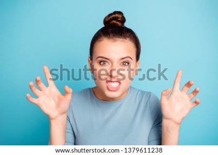 Close up photo beautiful she her lady arms hands raised showing claws violence frightening picture after watch horror film movie peekaboo wear casual sweater pullover isolated blue bright background