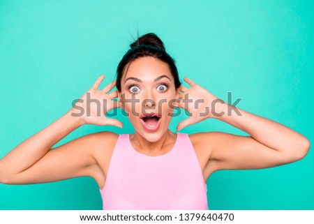 Close up photo beautiful she her lady trendy hairdo ideal appearance big eyes lucky achieve success hands arms hold head wear casual pink tank-top outfit clothes isolated teal turquoise background