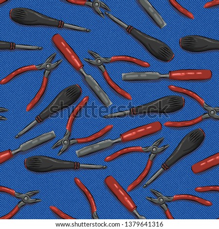 tools on a blue denim background, the chisel, screwdriver, pasatizhi Royalty-Free Stock Photo #1379641316