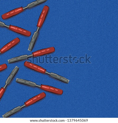 tool bit with an orange pen on a blue denim background with place for text