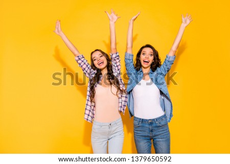 Portrait charming pretty teen teenager childish careless weekend holidays travel funny funky laugh scream shout raise hands arms long hair dressed checkered denim outfit isolated colorful outfit