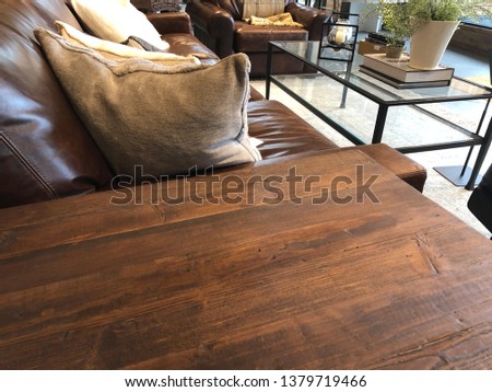 Empty rustic or vintage wooden table corner in living room of the background