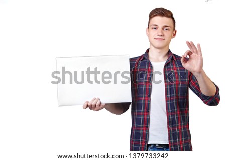 guy with a white sheet of paper