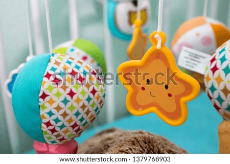 close-up picture of hanging baby toys