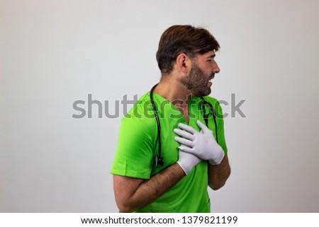 Photography of a veterinary doctor looking pain, facing forwards and looking at the side