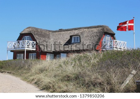 vacation home in demark dunes north sea Royalty-Free Stock Photo #1379850206
