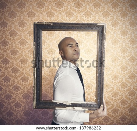 Businessman proud of himself inside a frame