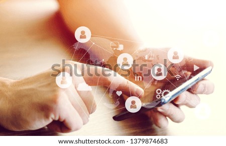 Young women using phones to broadcast live social media concepts, smartphones, social media, social networking concepts with smartphones 
    
    - Image