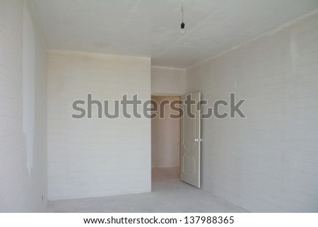 building repair - empty room with white wallpaper