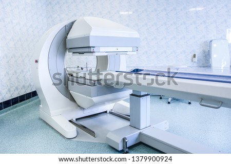 Gamma camera in the parlor of the clinic of nuclear medicine. Medical equipment in the hospital. Body examination equipment.  Royalty-Free Stock Photo #1379900924