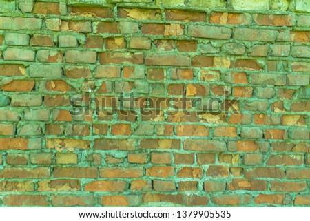wall with refractory bricks of red color. old building