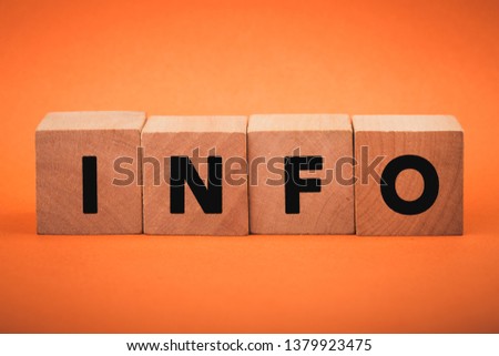 Four wooden blocks with Info text of concept.