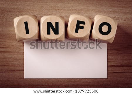Four wooden blocks with Info text of concept.