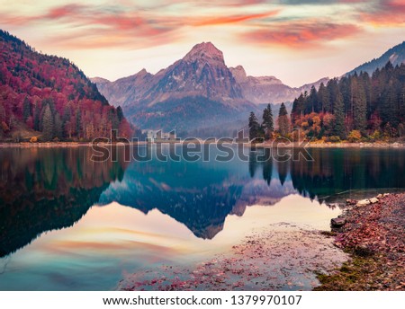 Captivating autumn view of Obersee lake, Nafels village location. Attractive morning scene of Swiss Alps, canton of Glarus in Switzerland, Europe. Beauty of nature concept background.
