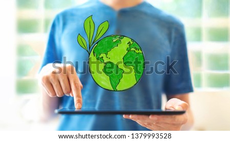 Save earth with young man using a tablet computer