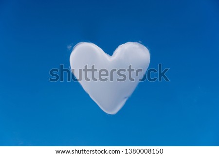 heart cloud on blue sky