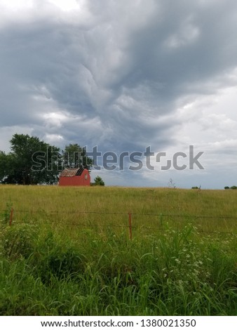 Cloudy skies over farms