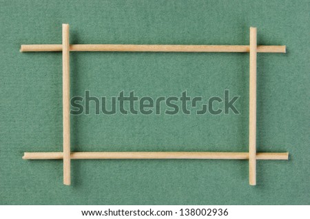 wooden frame on the green background